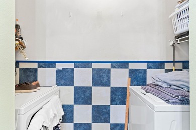 This ground floor 2-bedroom 2-bathroom unit is in one of the - photo 12