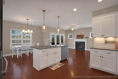 Located in the prestigious Gates Four Gated Golf Community, this