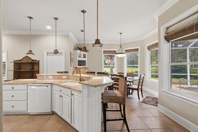 Custom-built home situated in the sought-after location in the - photo 14