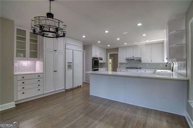 This stunning contemporary home offers modern elegance and - photo 17