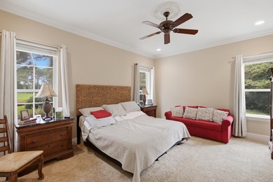 Custom-built home situated in the sought-after location in the - photo 18