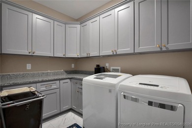 Located in the prestigious Gates Four Gated Golf Community, this