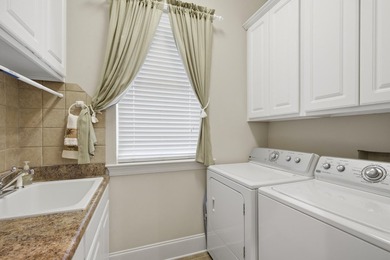 Custom-built home situated in the sought-after location in the - photo 20