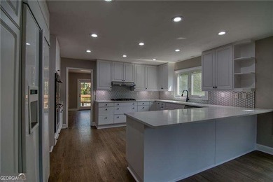 This stunning contemporary home offers modern elegance and - photo 21