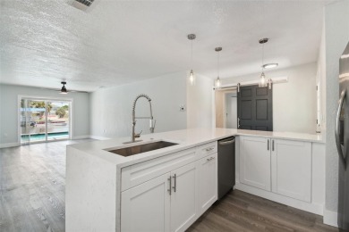 Welcome to your waterfront life; this spectacular 3 bedroom, 2 - photo 17