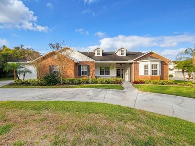 Discover a hidden Tampa area gem in the sought after gated - photo 2