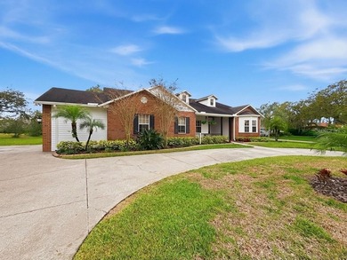 Discover a hidden Tampa area gem in the sought after gated - photo 3