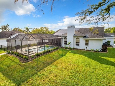 Discover a hidden Tampa area gem in the sought after gated - photo 4