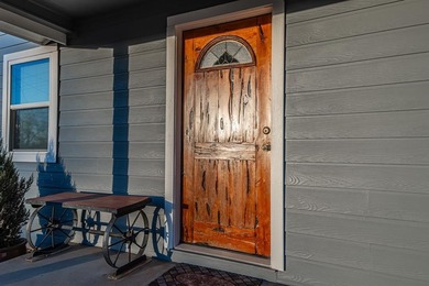 Situated on 2.9 acres, this 2,076-square-foot ranch-style home - photo 3
