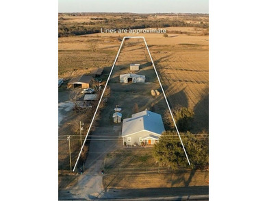 Situated on 2.9 acres, this 2,076-square-foot ranch-style home - photo 4