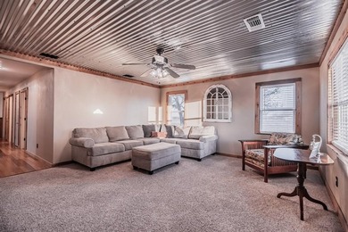 Situated on 2.9 acres, this 2,076-square-foot ranch-style home - photo 6