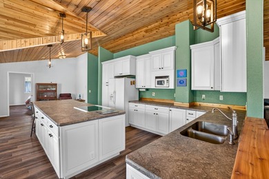 Mission Lake Waterfront at its best. This custom-built home has - photo 13