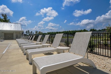 This spacious townhome boasts a first-floor primary suite, and - photo 44