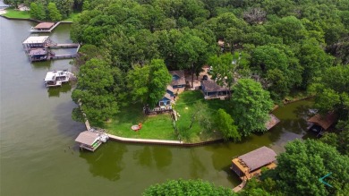 MULTIPLE HOMES on 300 ft +- of water front with a SHOP, an - Lake Home For Sale in Mabank, Texas