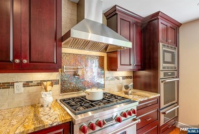 Set on a private and beautifully landscaped .8-acre property - photo 11