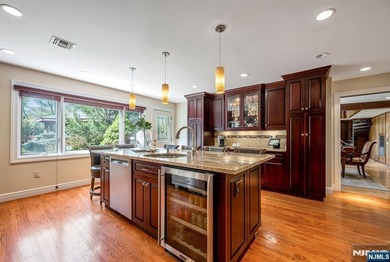 Set on a private and beautifully landscaped .8-acre property - photo 12