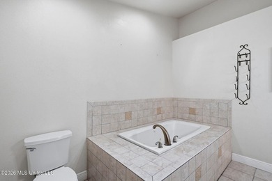 Welcome home to this spacious 4BR/2BA residence offering the - photo 14