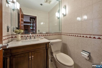 Set on a private and beautifully landscaped .8-acre property - photo 17