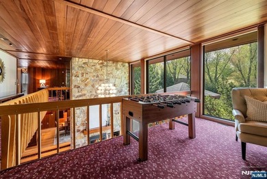 Set on a private and beautifully landscaped .8-acre property - photo 21