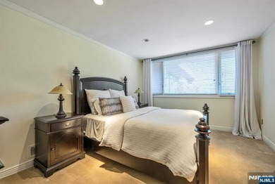 Set on a private and beautifully landscaped .8-acre property - photo 27