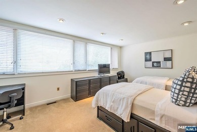 Set on a private and beautifully landscaped .8-acre property - photo 29
