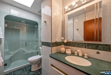 Set on a private and beautifully landscaped .8-acre property - photo 31