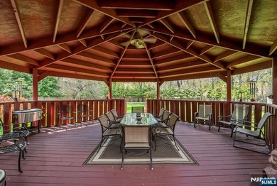 Set on a private and beautifully landscaped .8-acre property - photo 36