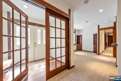 Set on a private and beautifully landscaped .8-acre property - photo 38