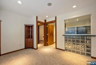 Set on a private and beautifully landscaped .8-acre property - photo 39
