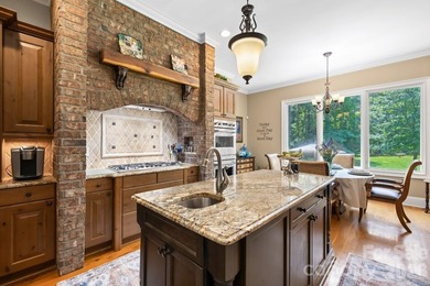 Discover a custom built retreat where timeless elegance, modern - photo 5