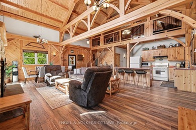 Set along the quiet shores of Shawenegog Lake, 1244 Marshall - photo 6