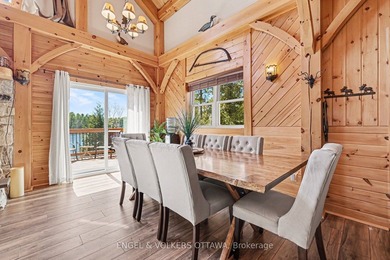Set along the quiet shores of Shawenegog Lake, 1244 Marshall - photo 10