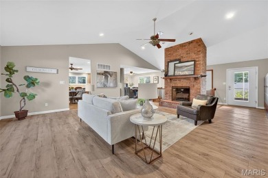 Welcome to this one-of-a-kind atrium 1 1/2 story home with a