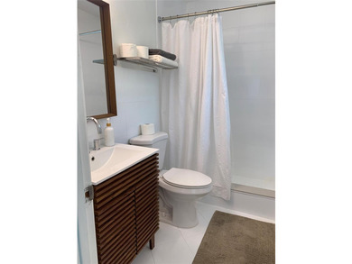 Exceptional corner-lot duplex in sought-after Tarpon River - photo 49