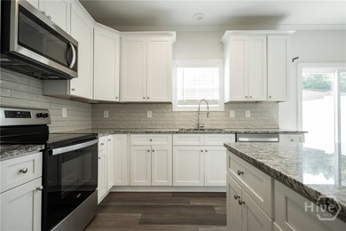 Welcome to easy living in the desirable Chimney Oaks Golf Course - photo 6