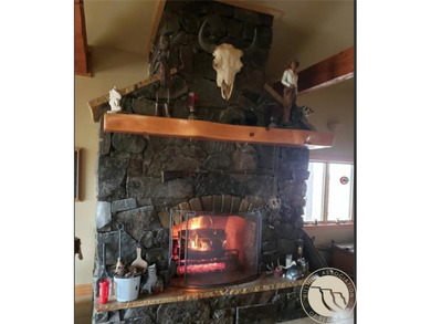 This custom-built Montana home features 2376+/- SQ/Ft of living - photo 7