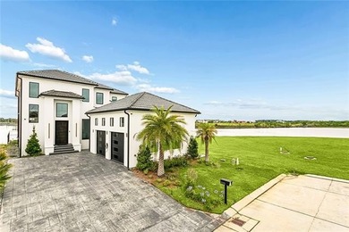 Experience true waterfront luxury in Lakeshore Estates with this - photo 2