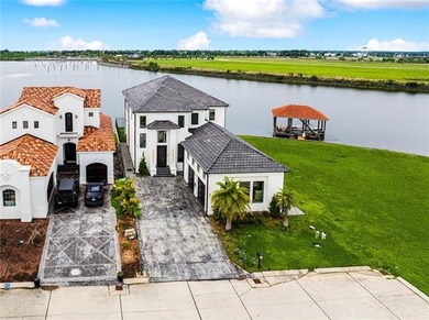 Experience true waterfront luxury in Lakeshore Estates with this - photo 3