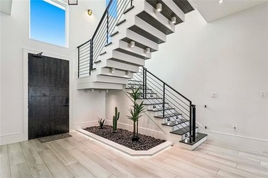 Experience true waterfront luxury in Lakeshore Estates with this - photo 7