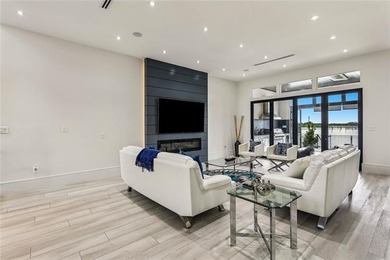 Experience true waterfront luxury in Lakeshore Estates with this - photo 8
