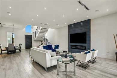 Experience true waterfront luxury in Lakeshore Estates with this - photo 9