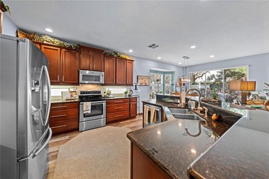 This beautiful 4-bedroom, 3-bath home in the gated Waters Edge - photo 11