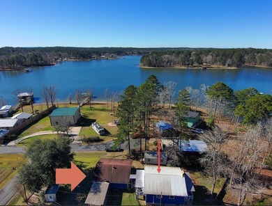 WATERFRONT! Tucked within a peaceful cove, this home is made for - photo 14