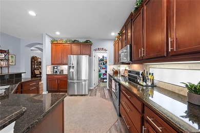 This beautiful 4-bedroom, 3-bath home in the gated Waters Edge - photo 16
