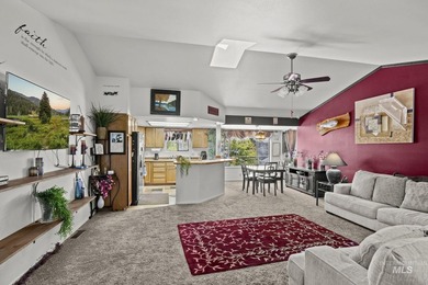 This top floor, three-bedroom, two bath condominium presents the