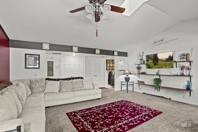 This top floor, three-bedroom, two bath condominium presents the