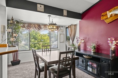 This top floor, three-bedroom, two bath condominium presents the