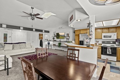 This top floor, three-bedroom, two bath condominium presents the