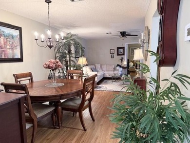 CONDO BEAUTIFUL!! This partially furnished end condo is updated - photo 3