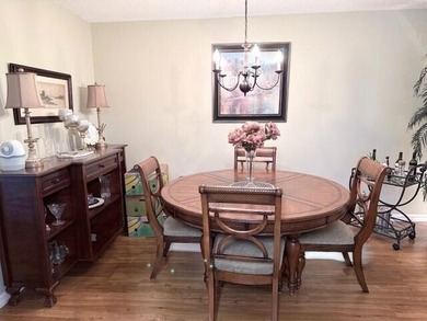 CONDO BEAUTIFUL!! This partially furnished end condo is updated - photo 8